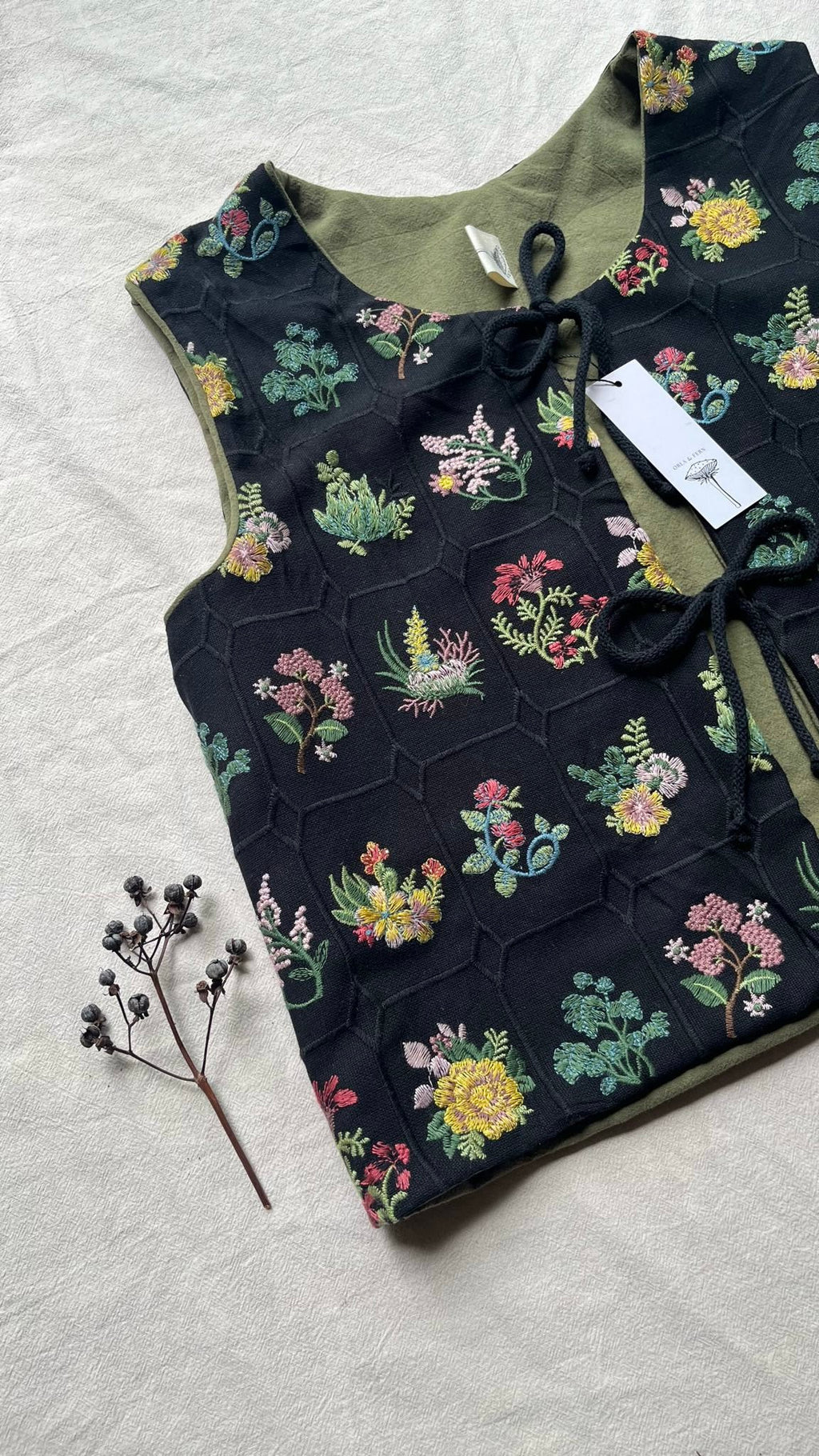 Embroidered tie front vest