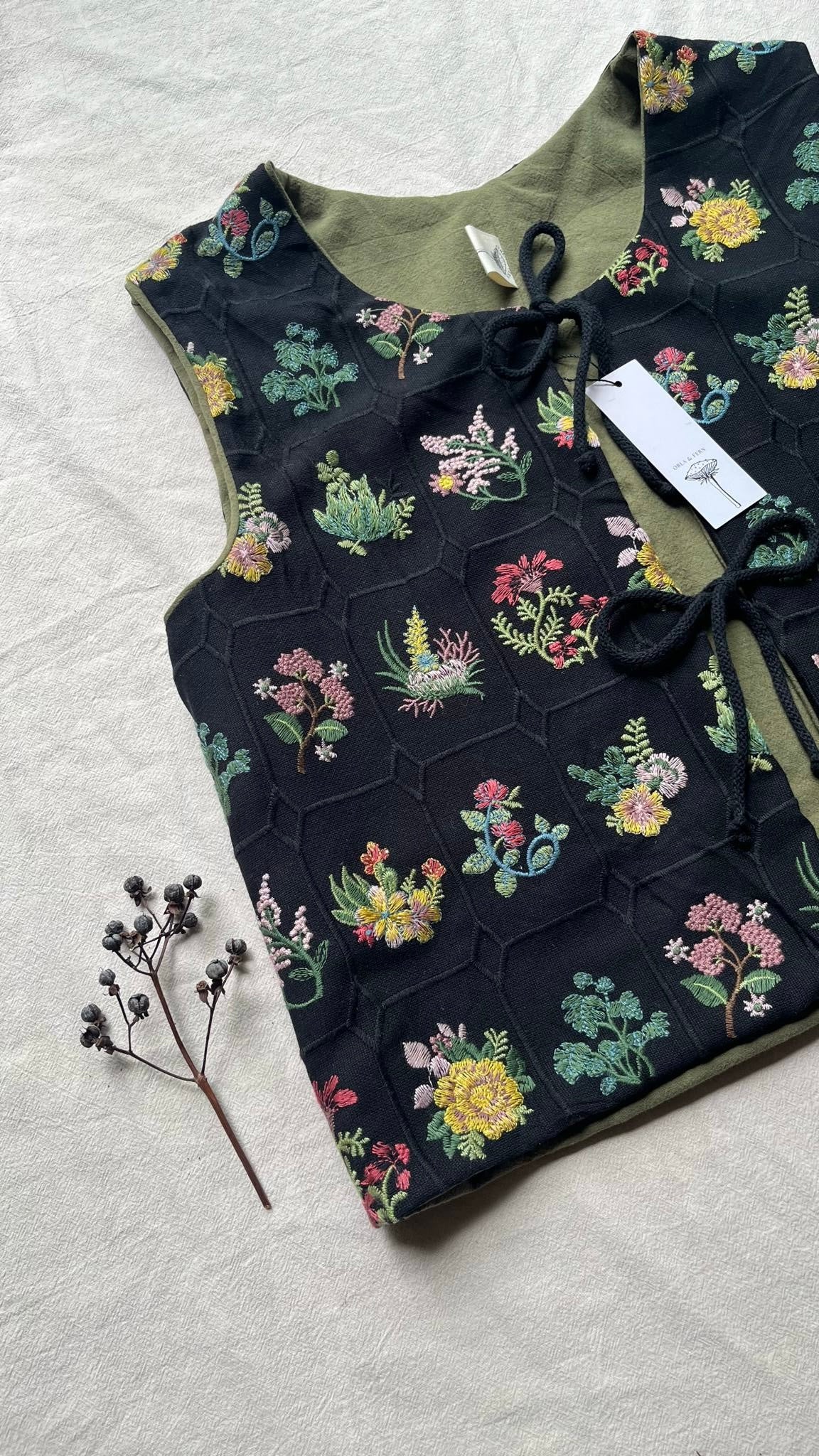 Embroidered tie front vest