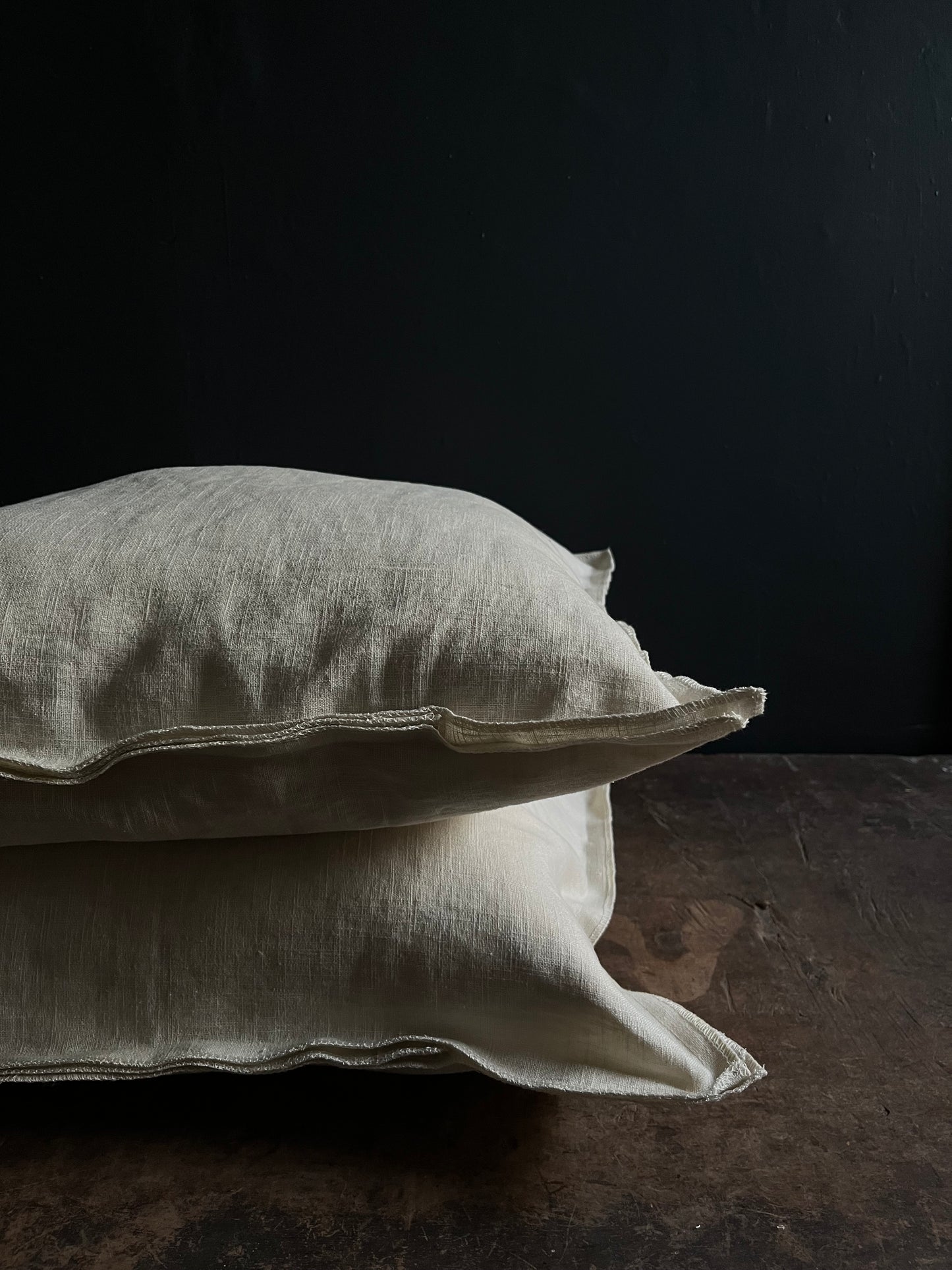 Textured washed linen serged edge cushion