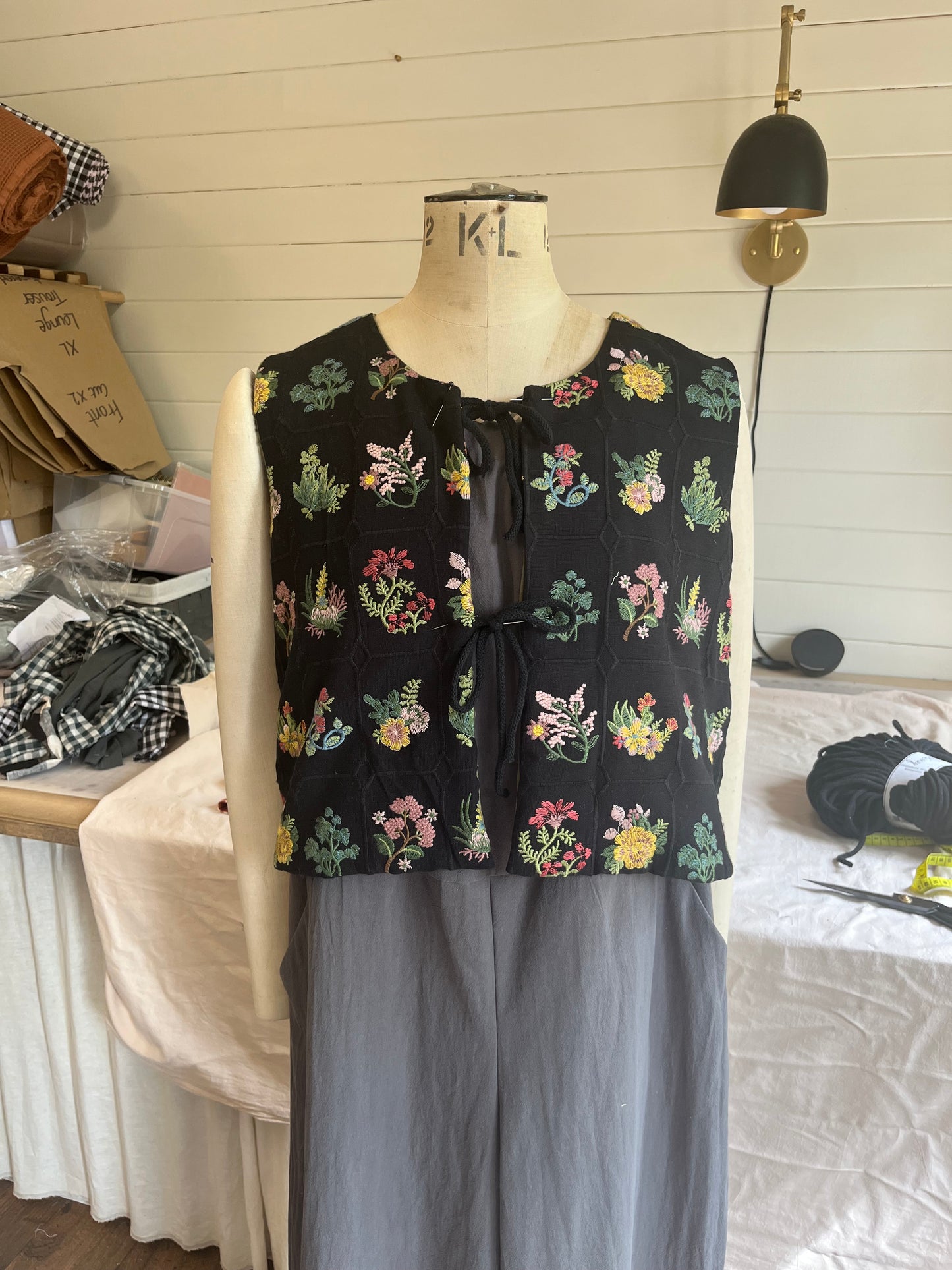 Embroidered tie front vest