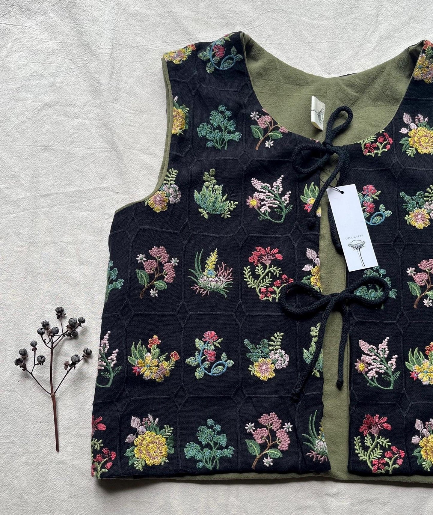 Embroidered tie front vest