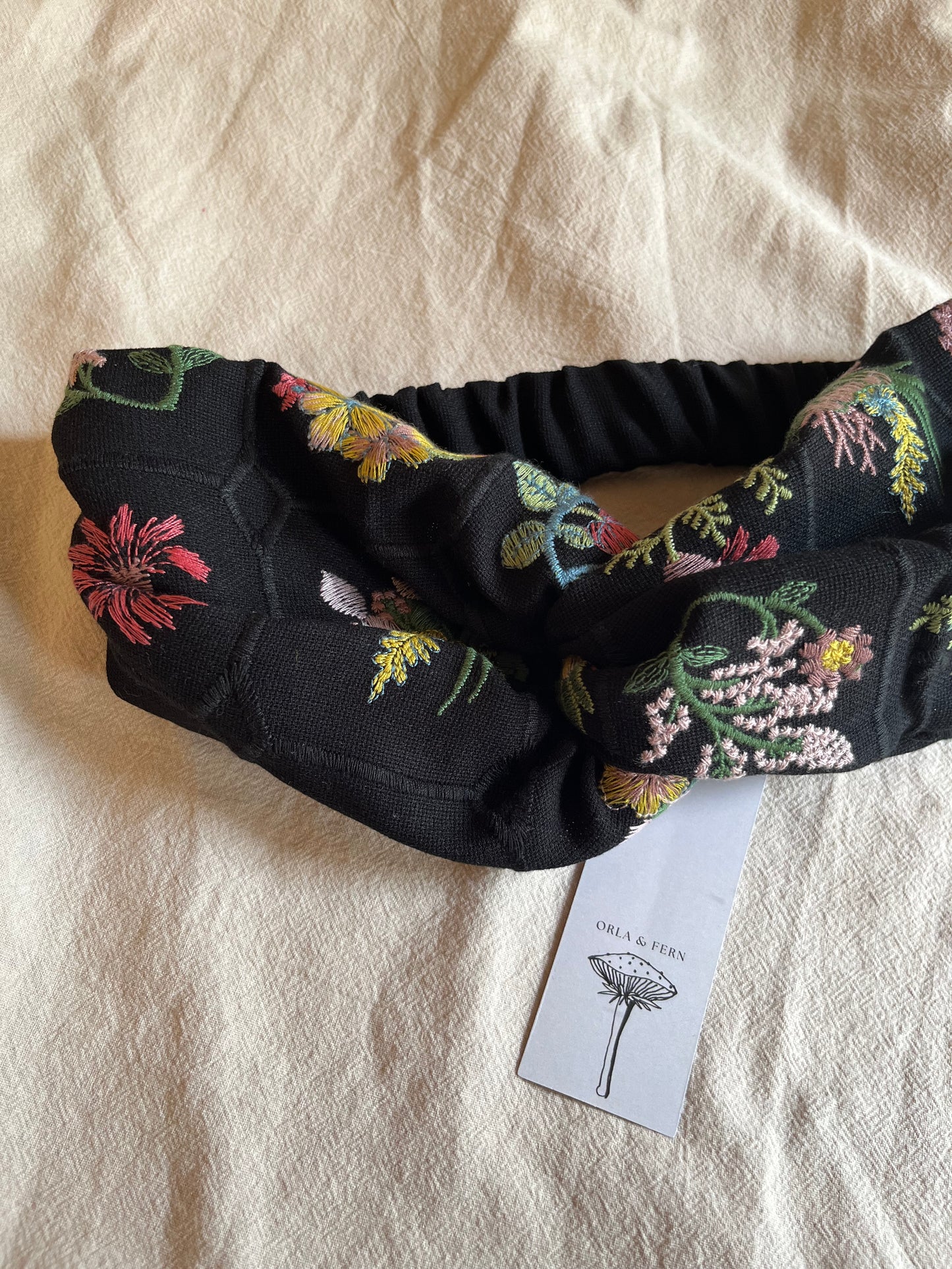 Embroidered black floral headband