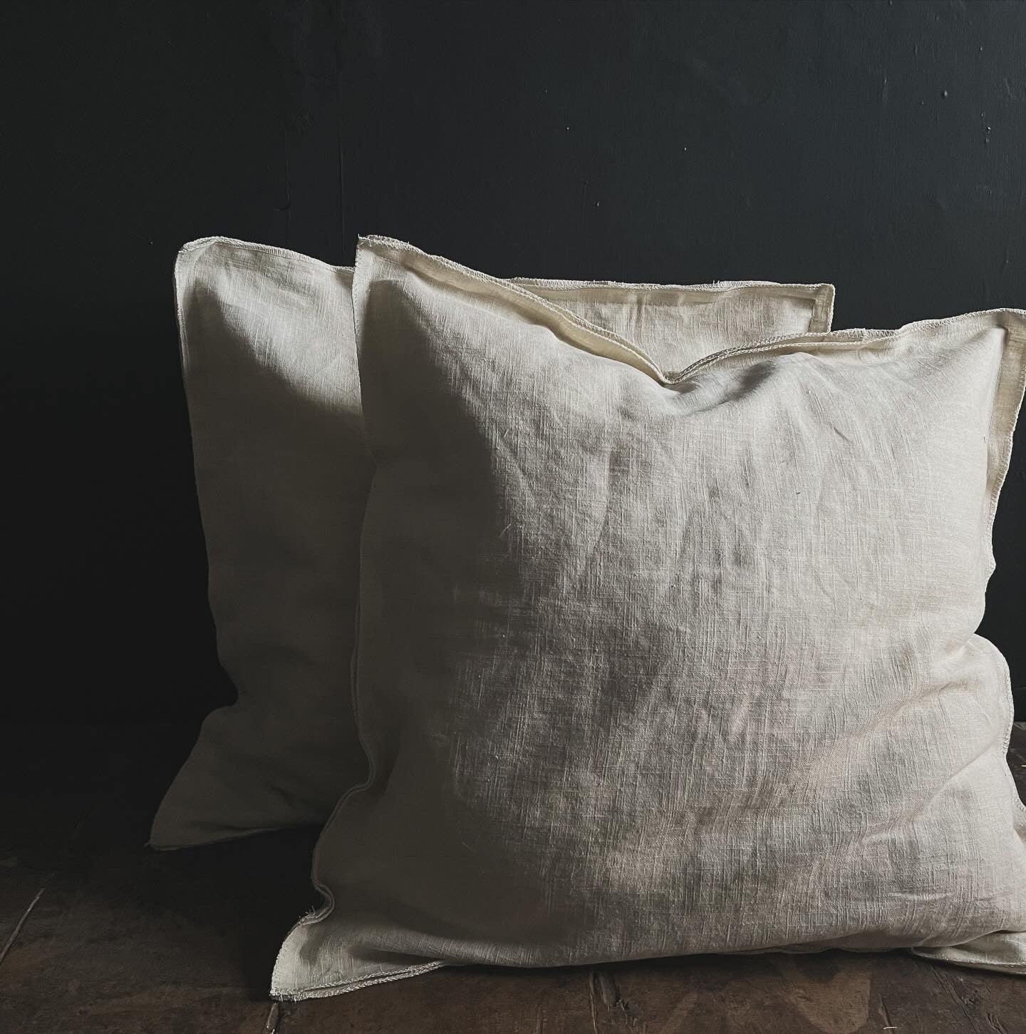 Textured washed linen serged edge cushion