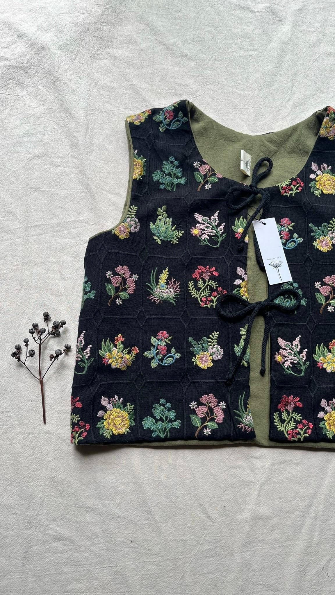 Embroidered tie front vest