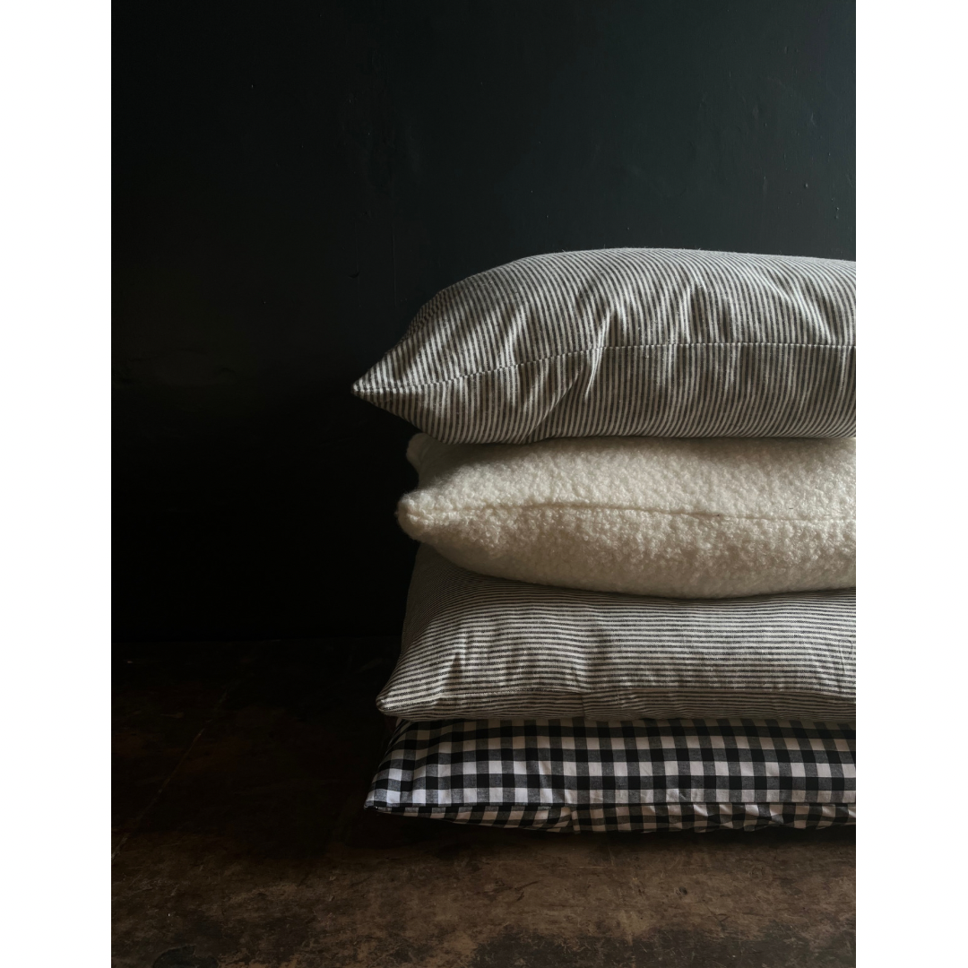 Textured washed linen serged edge cushion