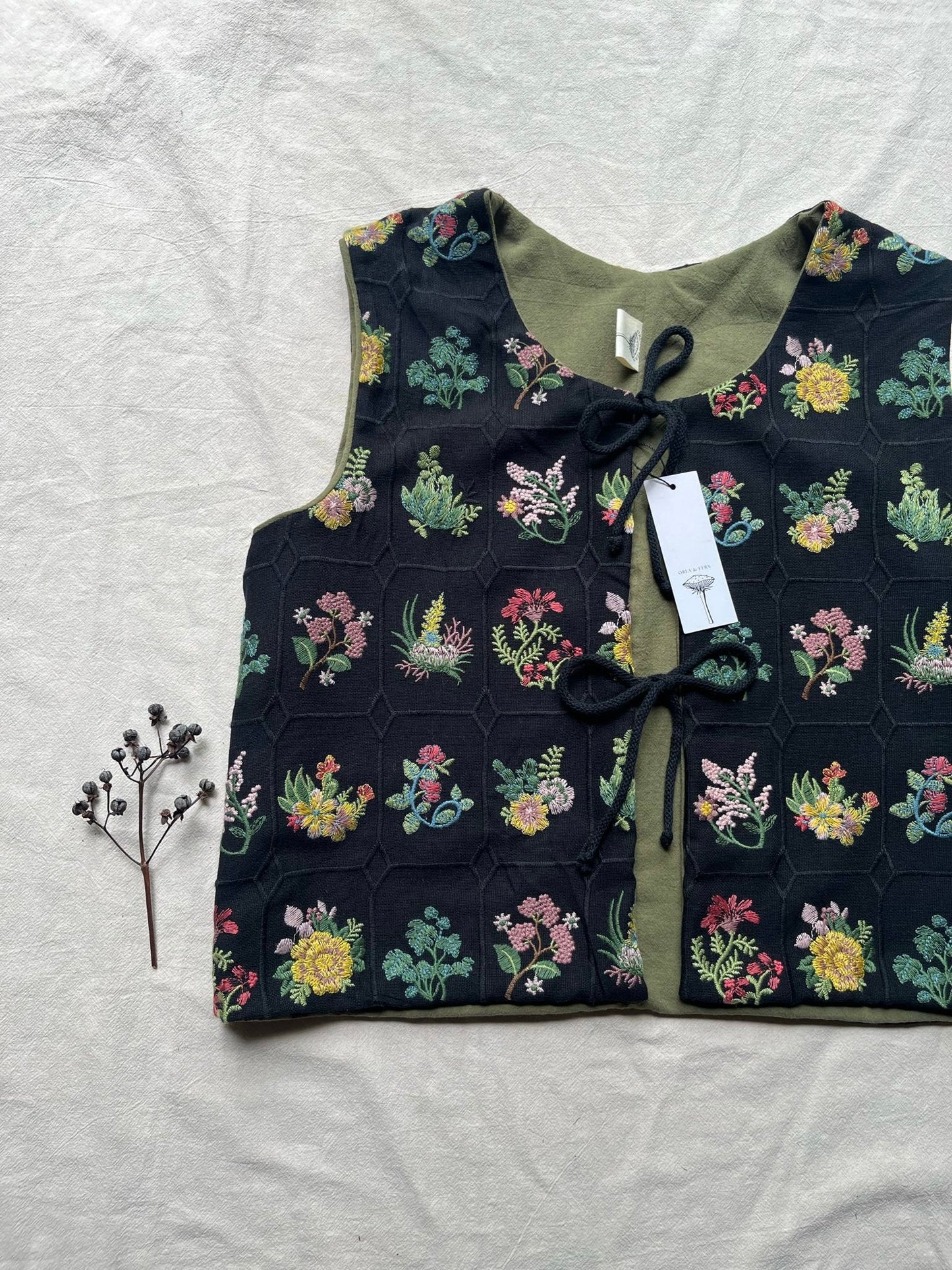 Embroidered tie front vest