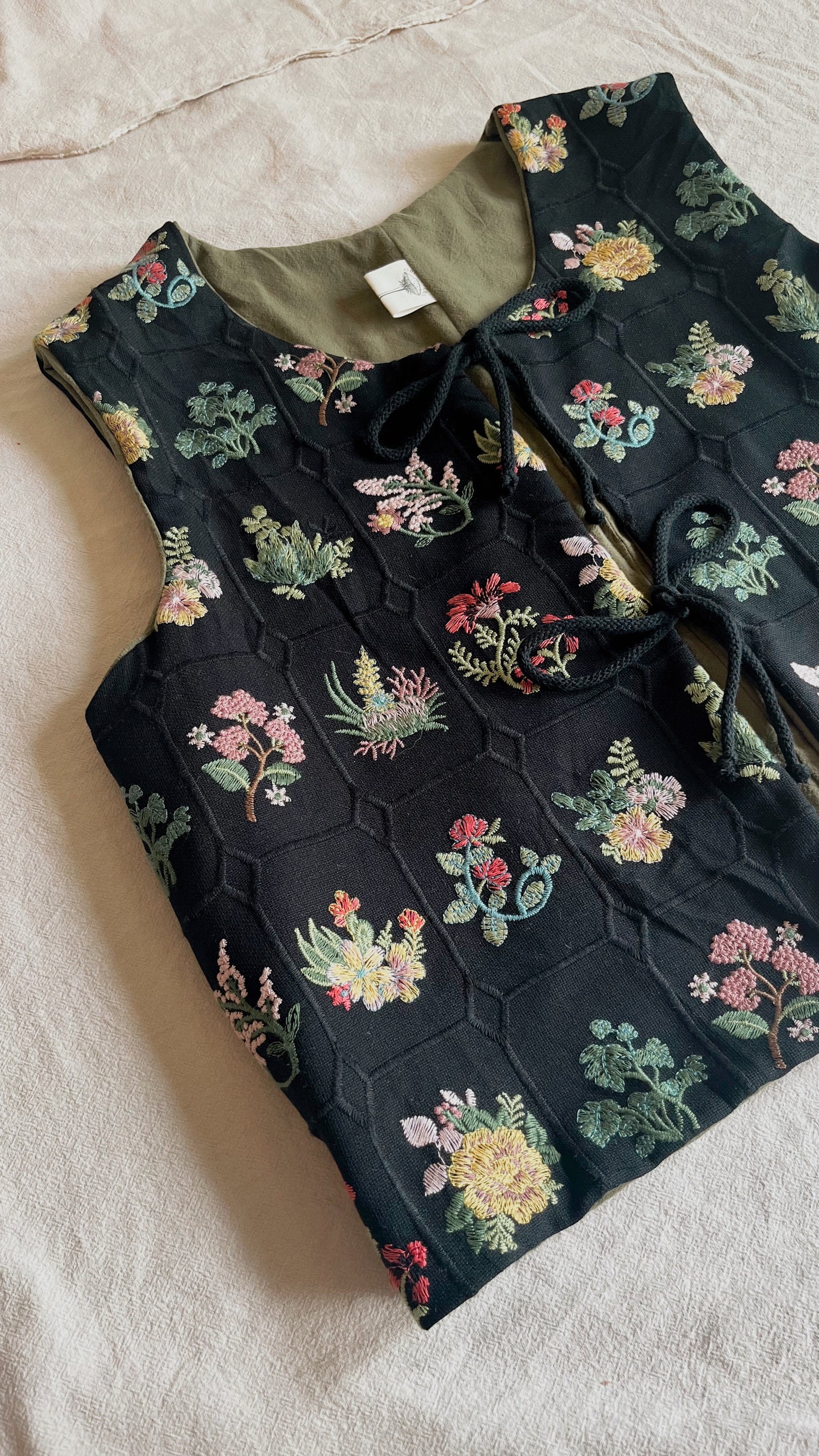 Embroidered tie front vest