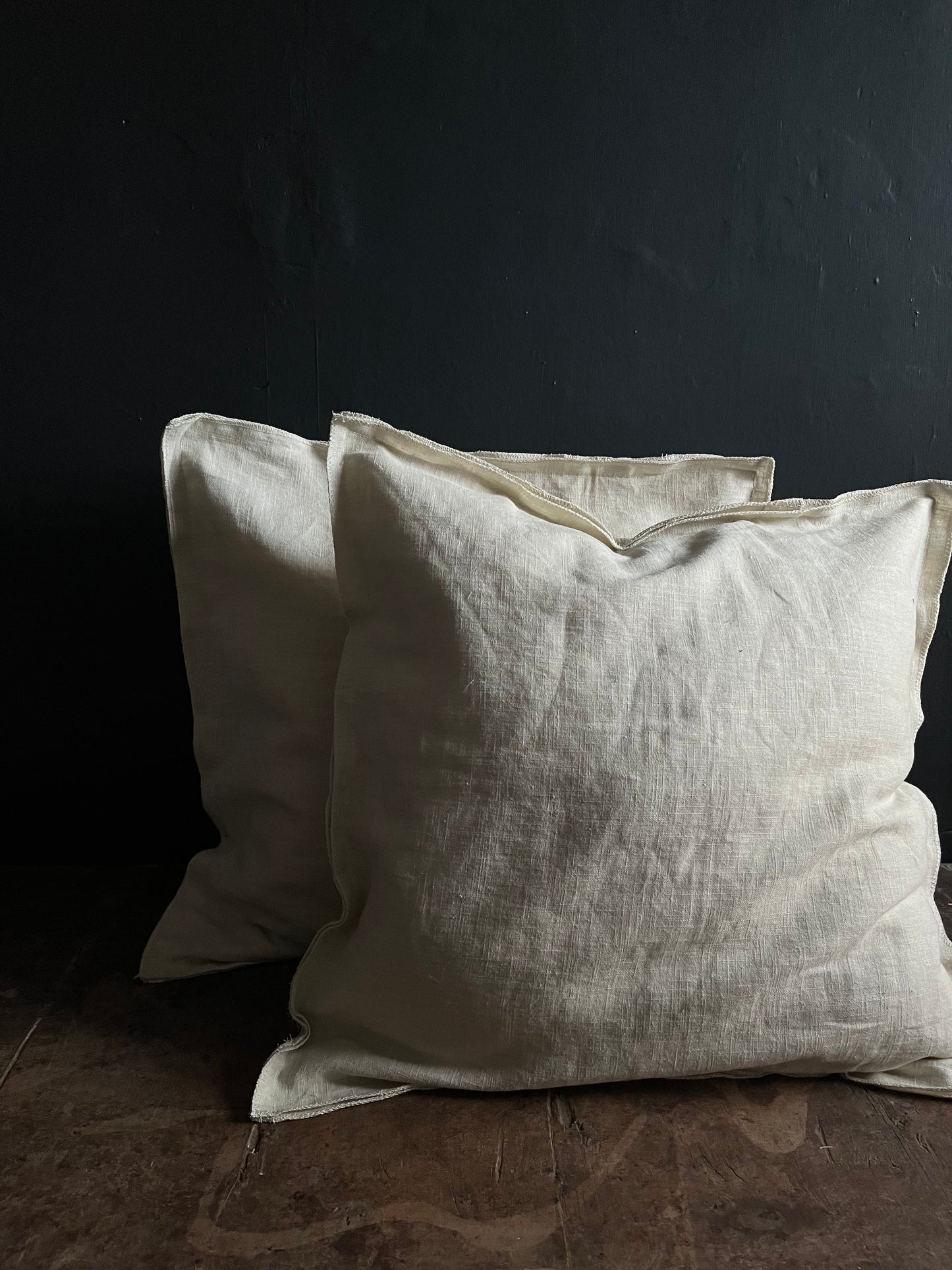 Textured washed linen serged edge cushion