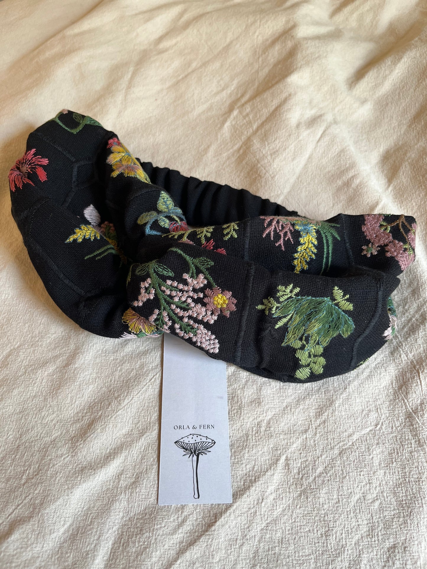 Embroidered black floral headband