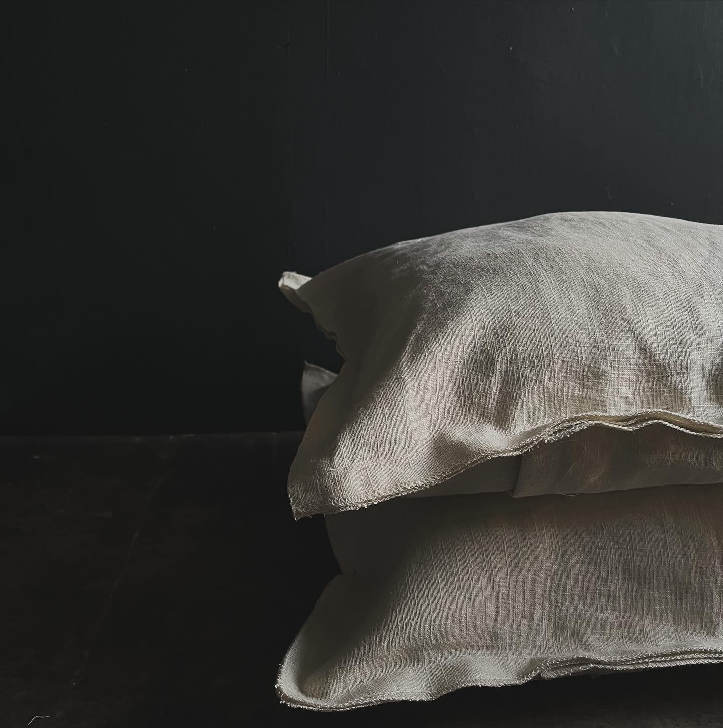 Textured washed linen serged edge cushion