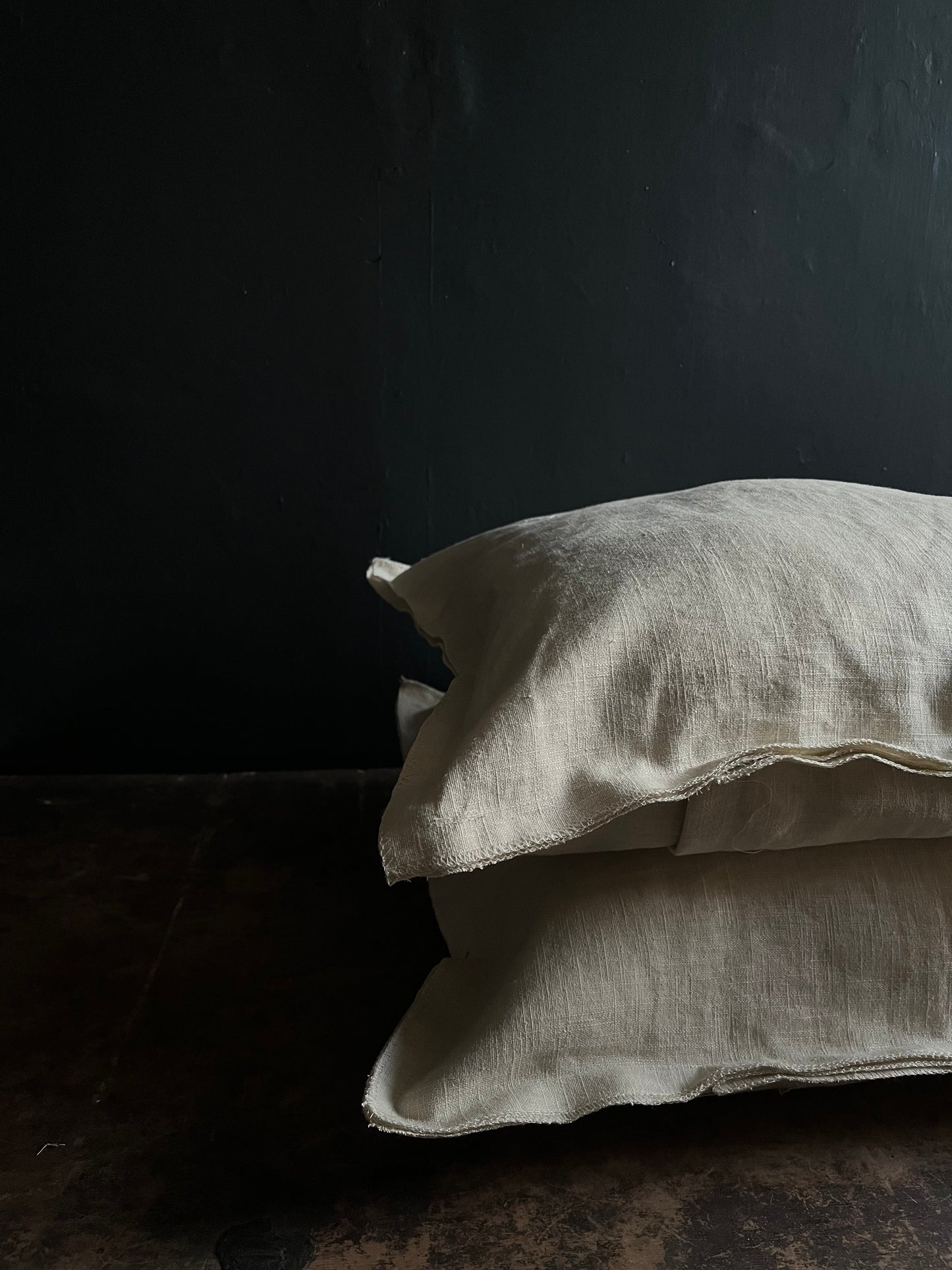 Textured washed linen serged edge cushion